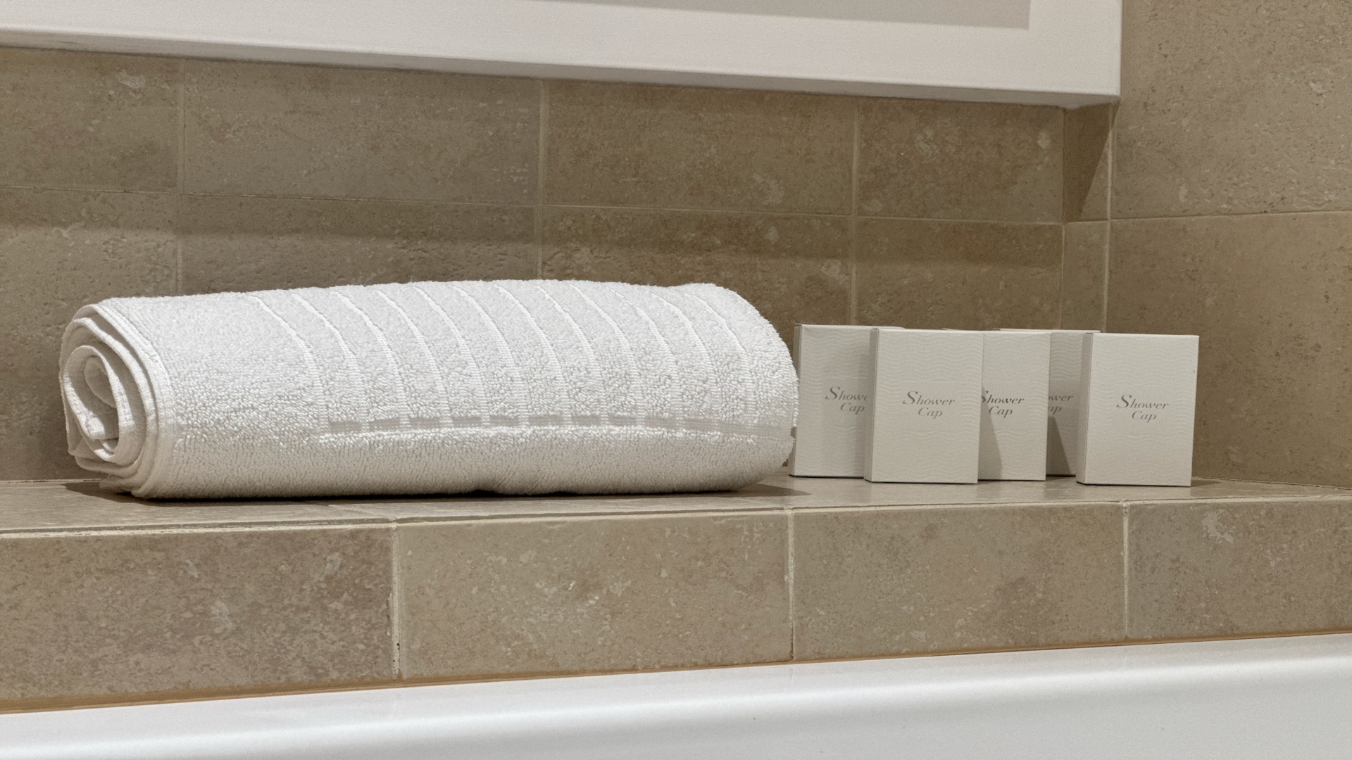 Towels and toiletries in the bathroom