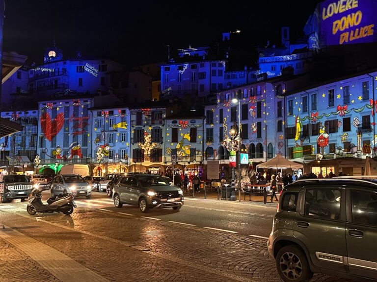 The lights of the Lovere Light Gallery illuminating the village's facades in December
