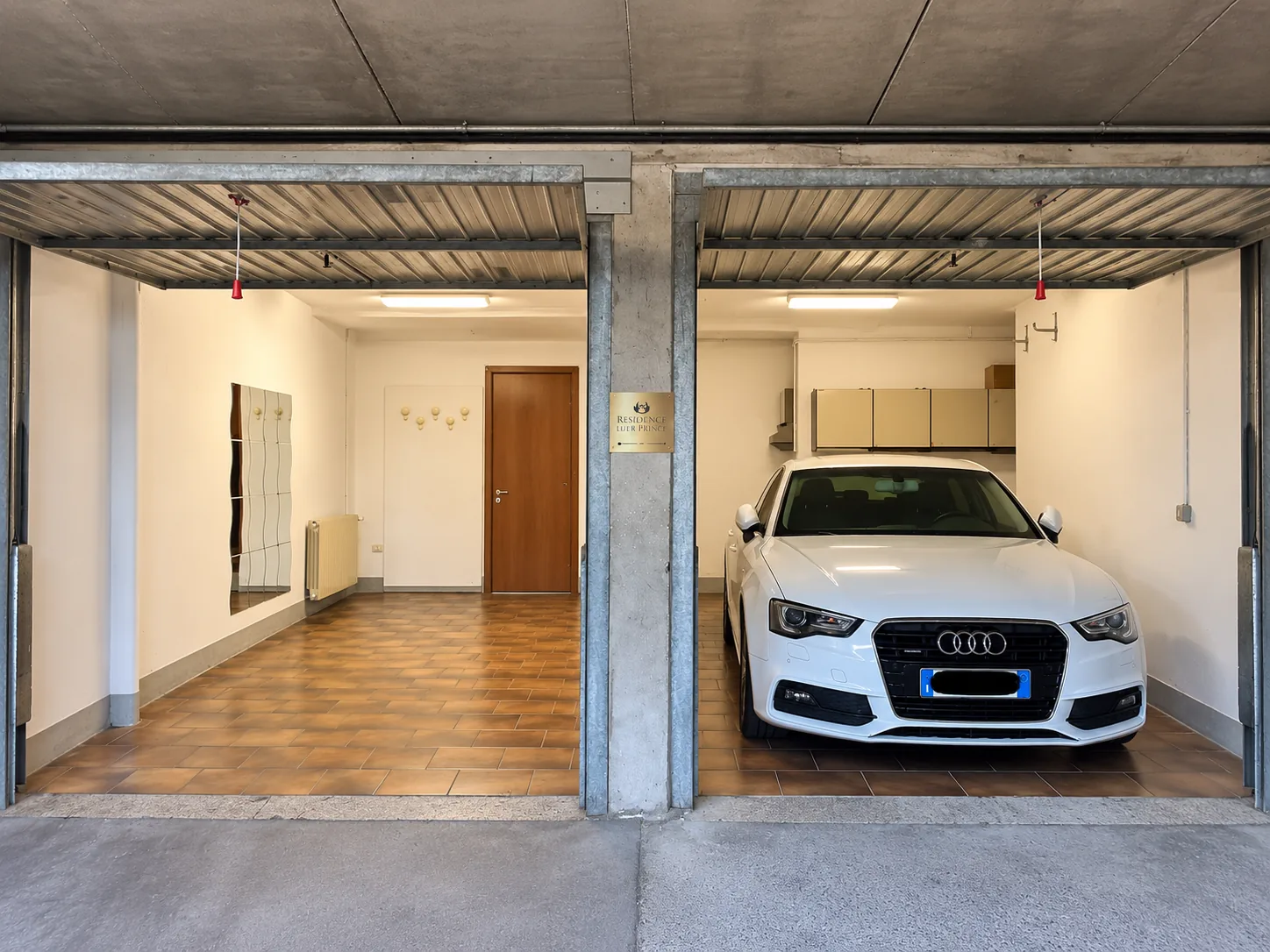 Covered double garage with direct access to the house