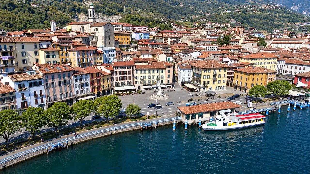 The lakeside promenade in Lovere with a boat moored there on Lake Iseo