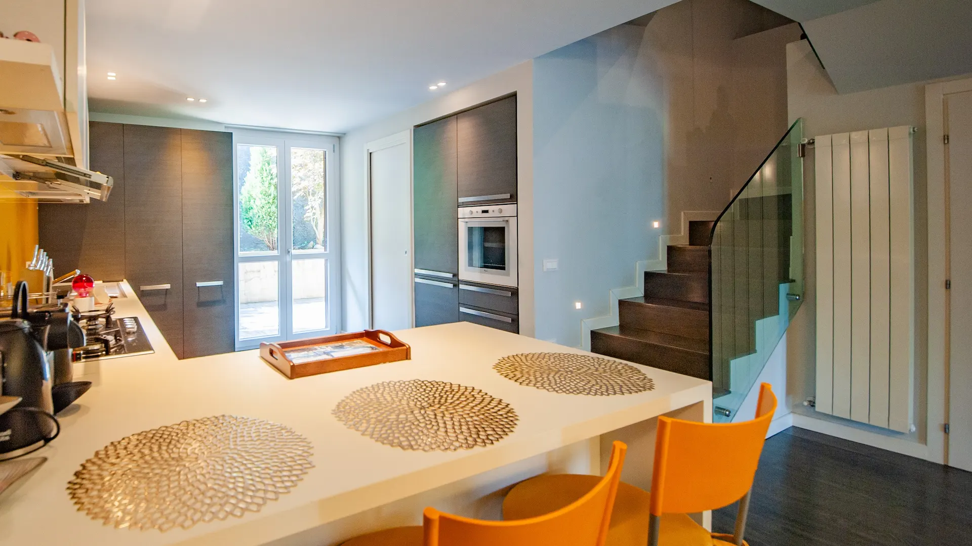 Fully equipped kitchen with an island on the ground floor